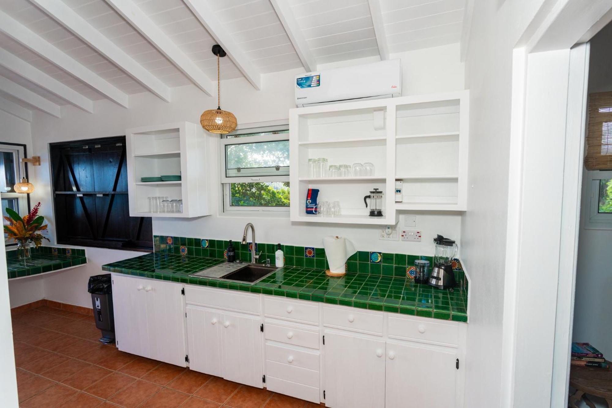 Hodges Bay House Apartman Calibishie Kültér fotó